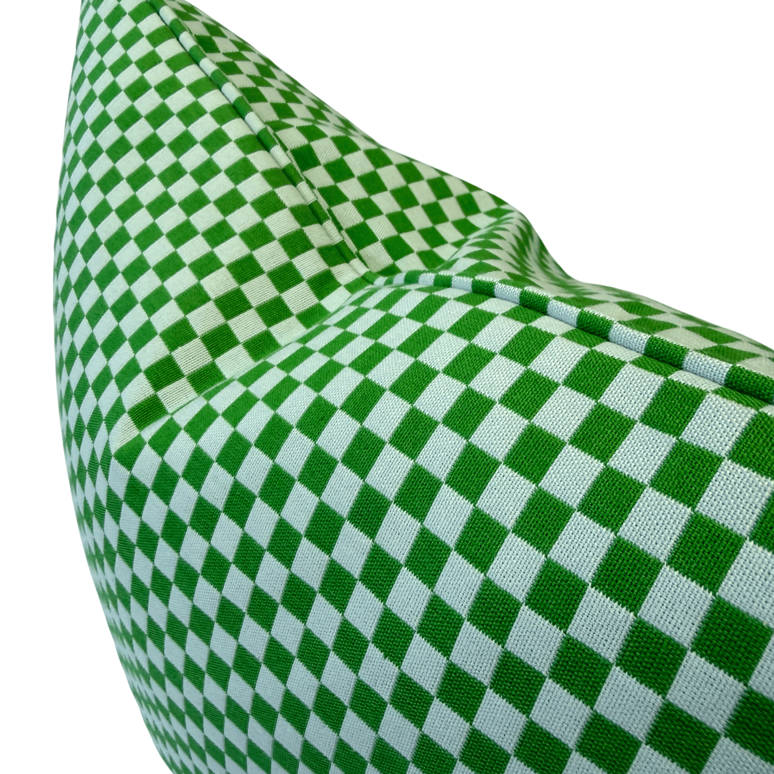 A close-up of a green and gray checkered fabric cushion or pillow corner on a plain white background.