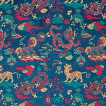 A close-up of a fabric pattern featuring traditional Chinese-style motifs, including red dragons, golden lions, and green foliage, all set against a deep teal-blue background.