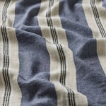 Linia Drapery Volterra blue and beige striped fabric with black narrower stripes.