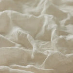 Linia Sheer Tiamo Eggshell off-white fabric with a slightly textured, linen-like surface.