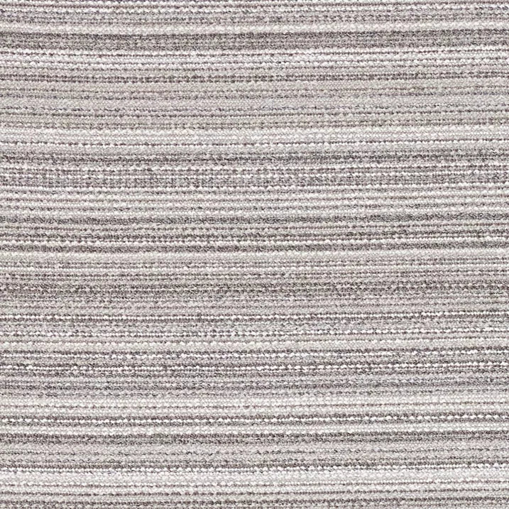 A close-up of a woven fabric or carpet texture with horizontal stripes in light gray, taupe, beige, and off-white.