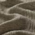 linia Inari Olive drapery fabric Close-up of textured fabric with visible weave pattern