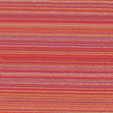 A close-up of a nimbin hibiscus textile with horizontal stripes in red, orange, pink, and purple tones.