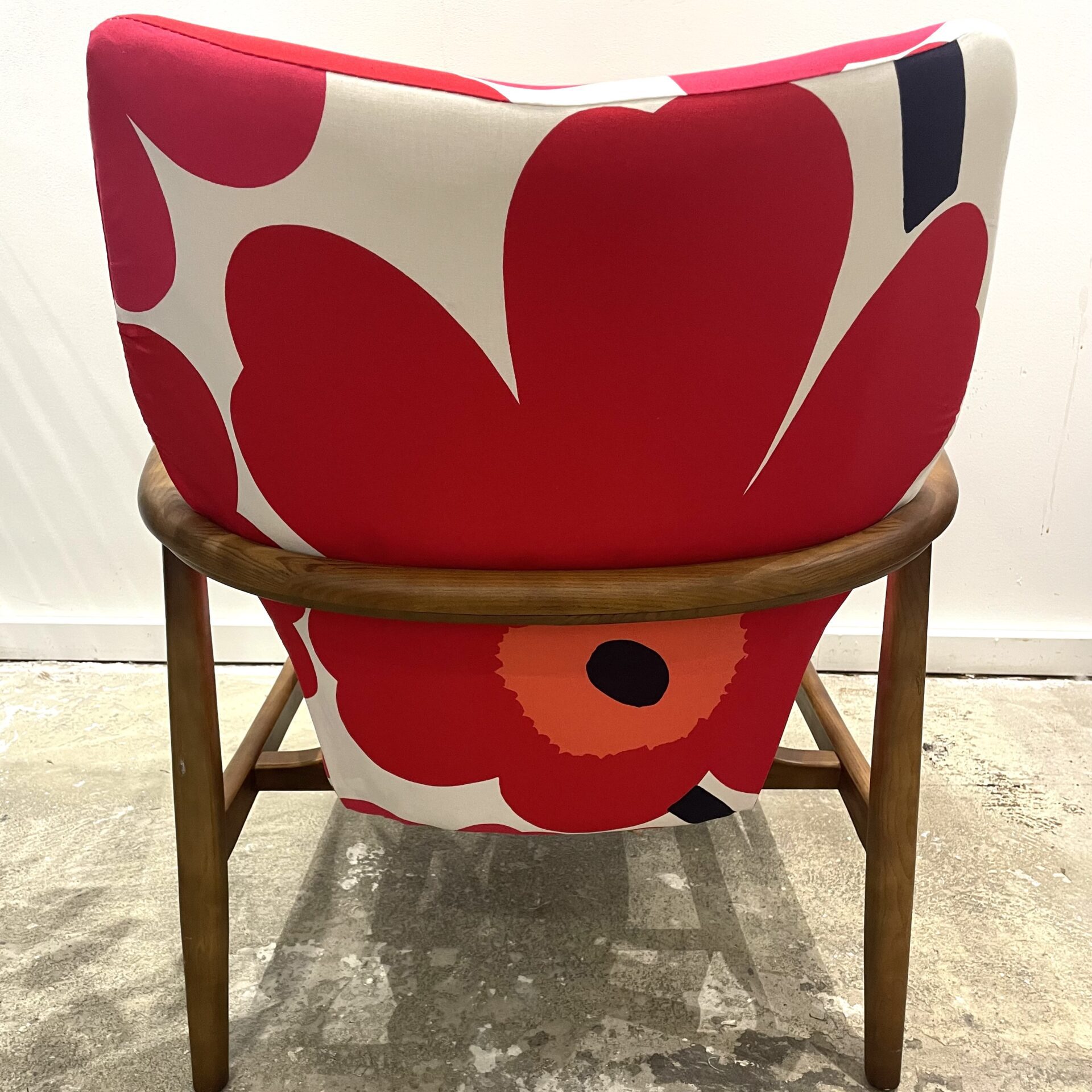 Danish Chairs upholstered in the Marimekko Unikko fabric. 100% Cotton.
