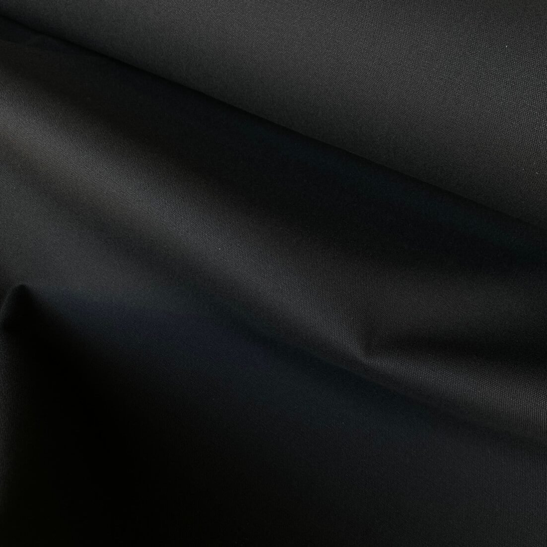 Black Cotton Canvas. 100% cotton fabric in black.