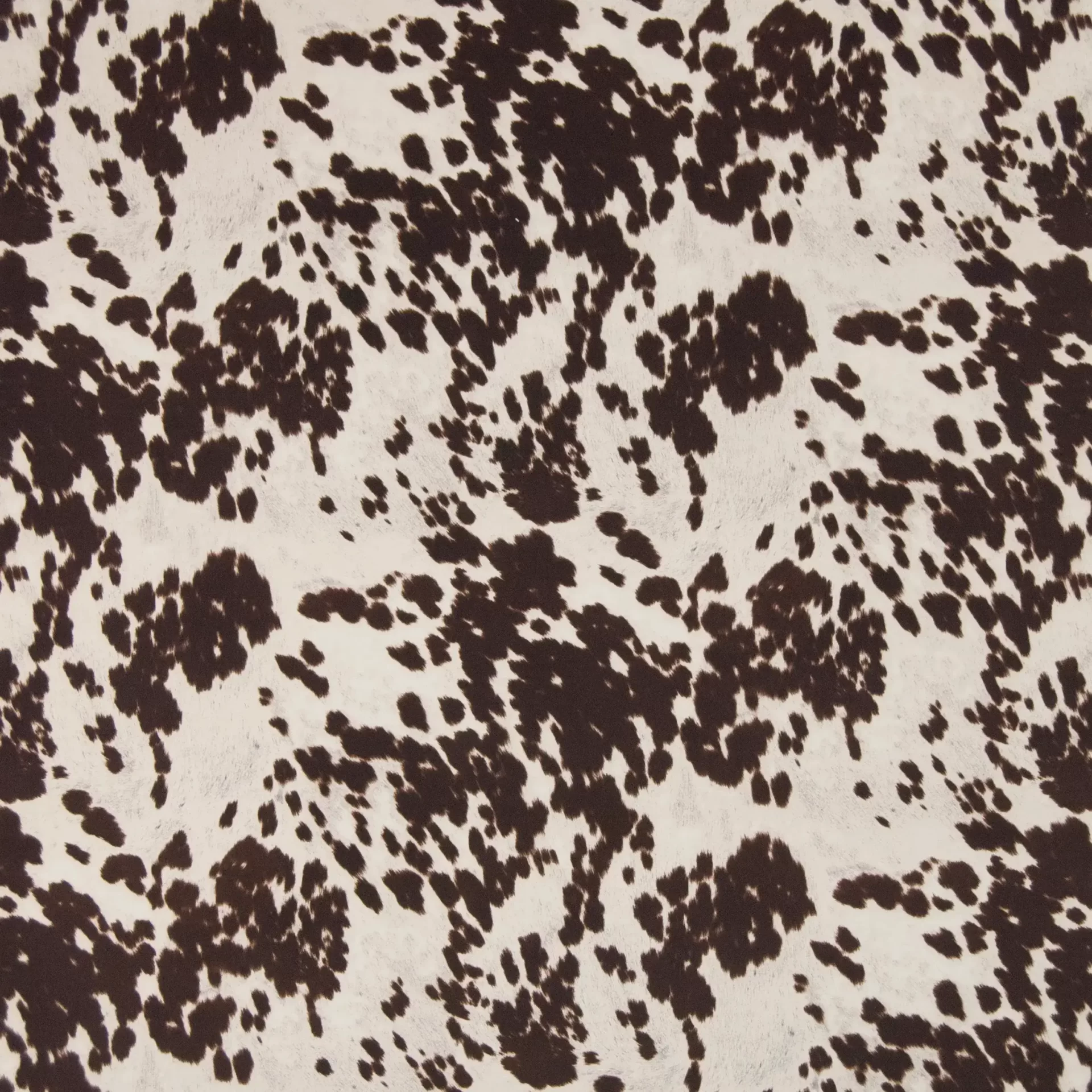 Cow Grain by Warwick Fabrics. Cow Print Upholstery Fabric.